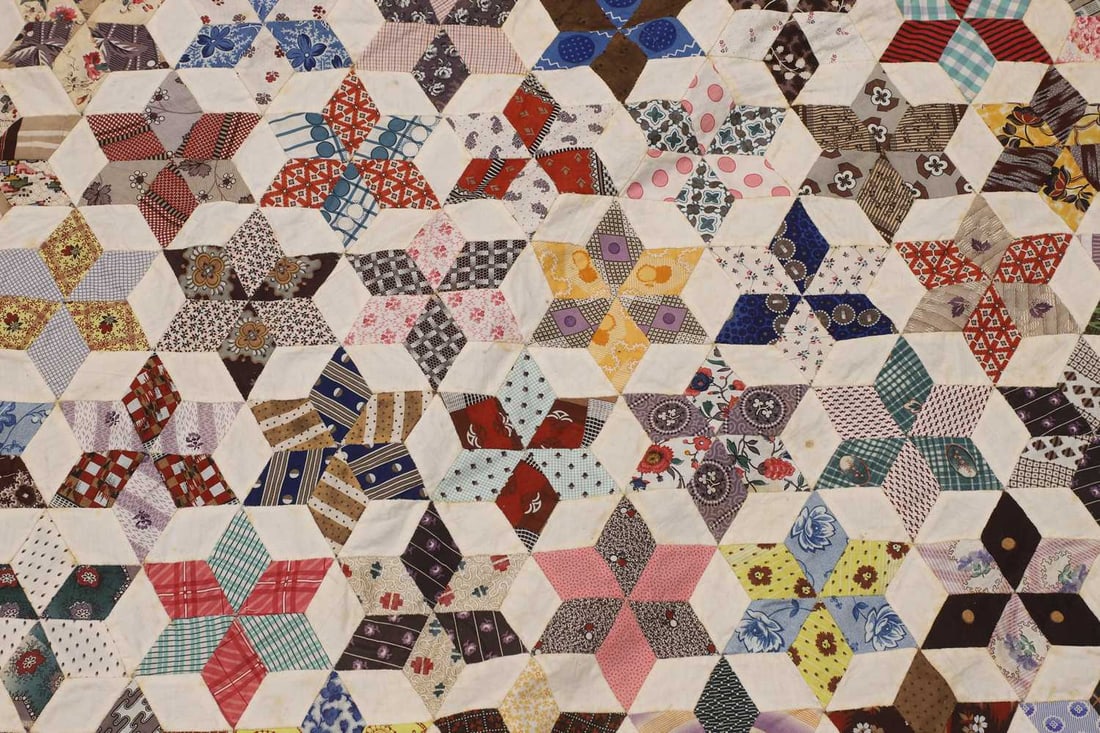 A hand-sewn patchwork quilt, 19th century, American, - 2