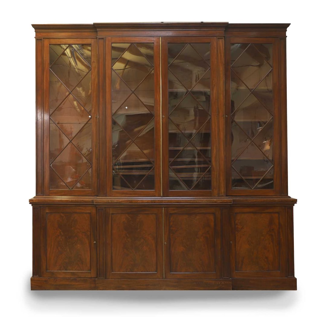 A George III mahogany library bookcase, early 19th century and later, (1 of 2)