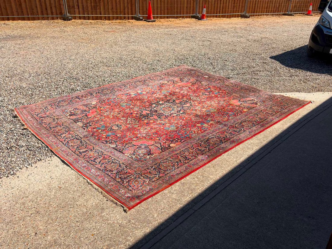 A hand knotted Persian carpet, 20th century, (1 of 4)