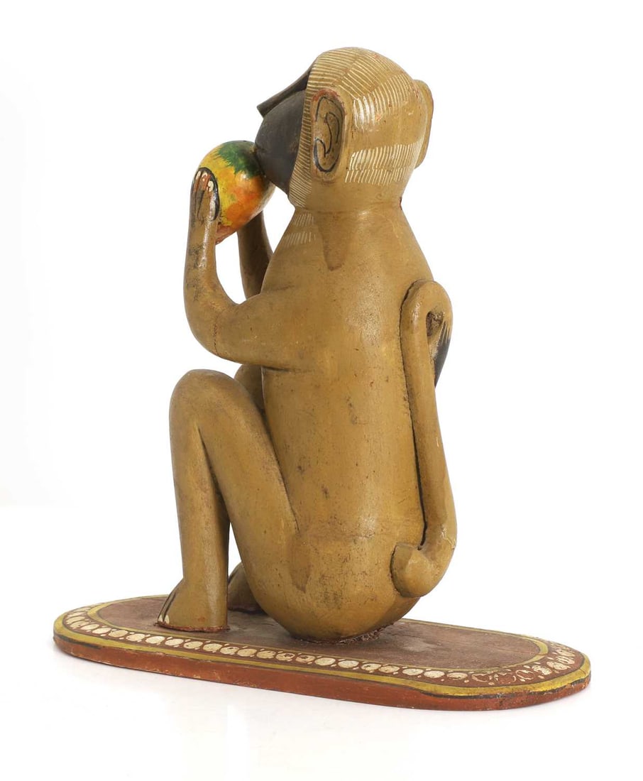 An Indian polychrome painted carved wood monkey, 19th-20th century, - 2