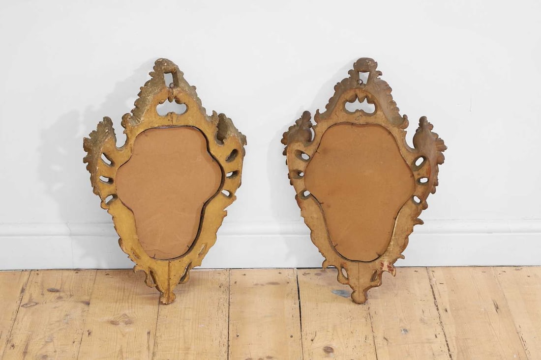 A pair of carved and painted wooden wall mirrors, 20th century, Italian, - 2