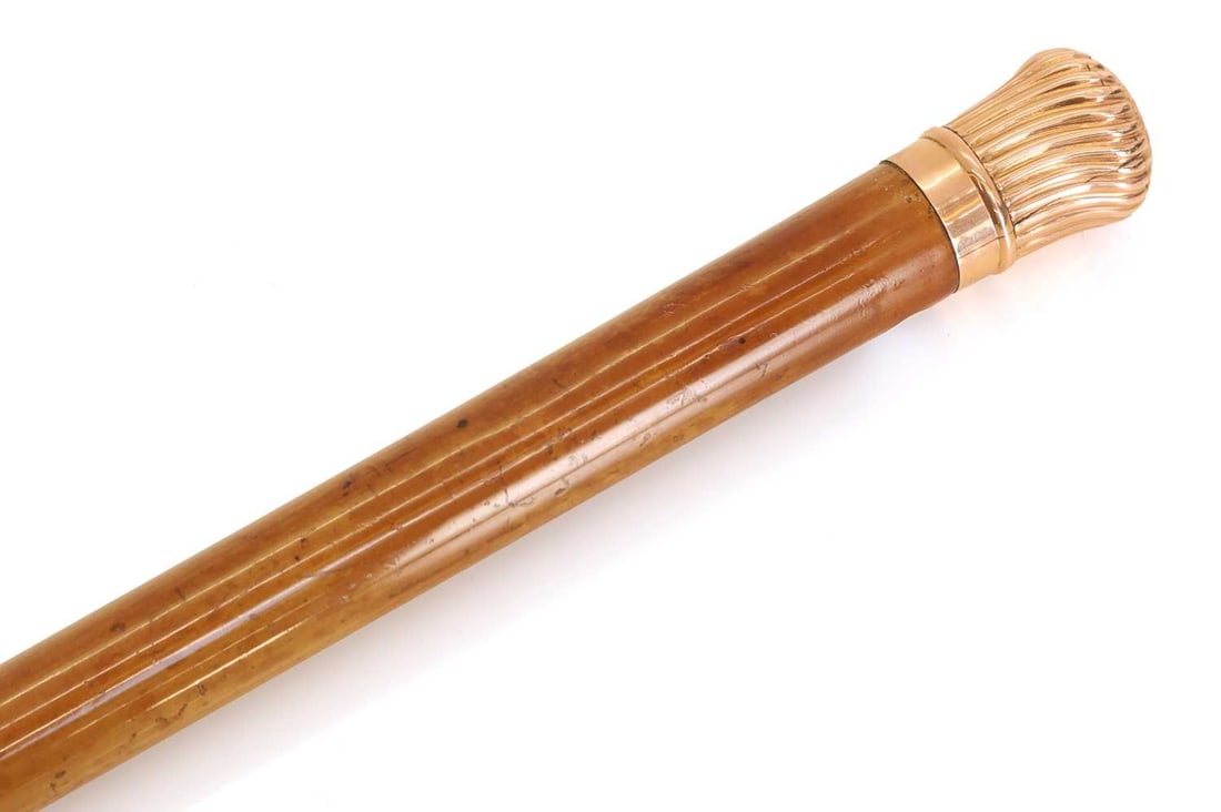 A 9ct mounted walking cane, London, 1889, - 2