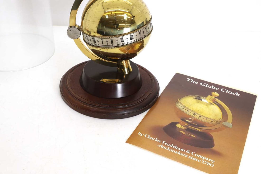 A Charles Frodsham globe clock, - 2