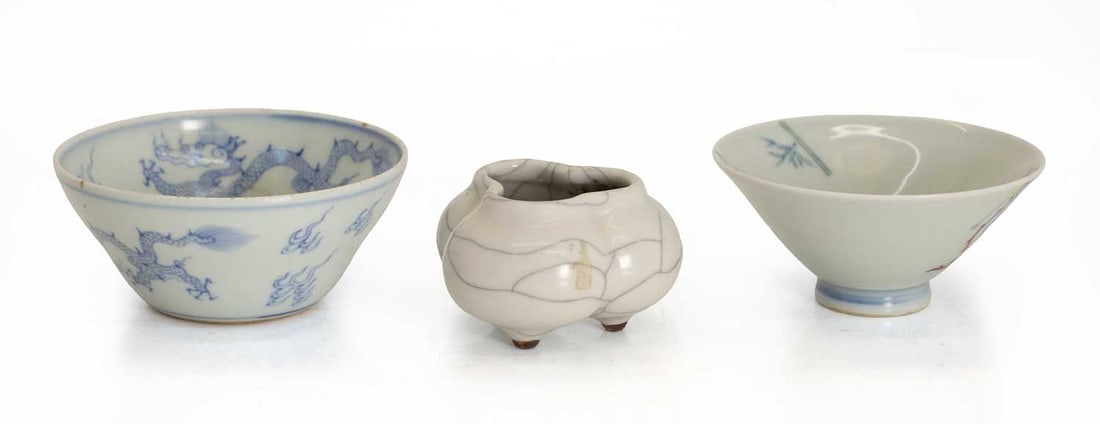 A collection of Chinese porcelain,: A collection of Chinese porcelain, comprising a Ge-type water pot covered overall with a crackled glaze, a teabowl of conical form, painted with phoenix and bamboo, bearing a four-character mark to th