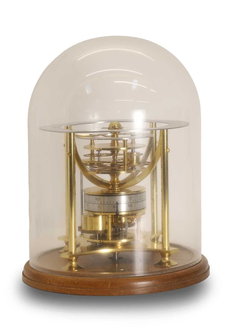 A Heritage Collection calendar clock, - 2