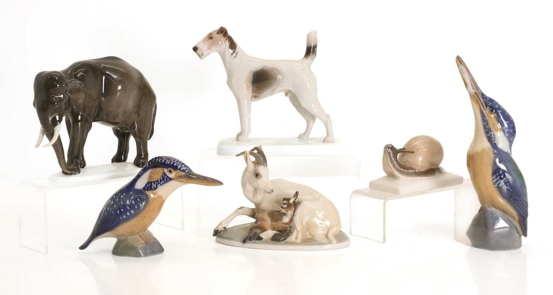 A collection of Rosenthal porcelain figures, 20th century and later,: A collection of Rosenthal porcelain figures, 20th century and later, to include a fox terrier and a snail, an elephant and a goat tending to a younger kid, all with markings to the base and signed on