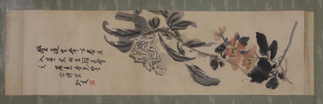 A Chinese hanging scroll, 20th century,: A Chinese hanging scroll, 20th century, after Huang Binhong, painted with a chrysanthemum above a floral spray, inscribed and signd with an artist's seal, ink and colour on paper 85 x 27cm Condition R