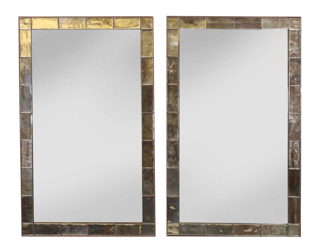 A pair of Julian Chichester 'Lucca' mirrors,: A pair of Julian Chichester 'Lucca' mirrors, the frame with opaque mirrored glass panels with a central rectangular plate and red outer frame 70cm wide, 113cm cm high 2 Condition Report: Some marks an
