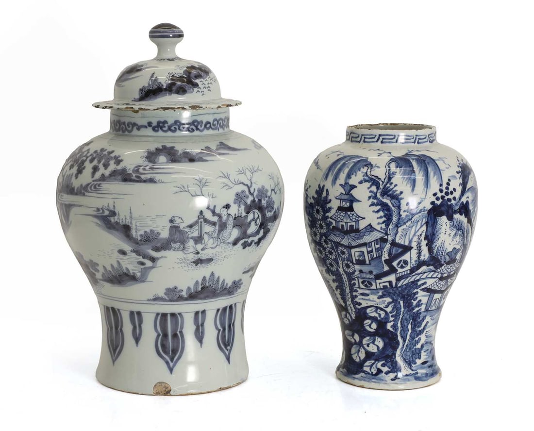 Two blue and whites vases, Continental,: Two blue and whites vases, Continental, Chinese style, the first of baluster form, decorated with figures in a rock garden, with lid and label to the underside, the second decorated with a pagoda