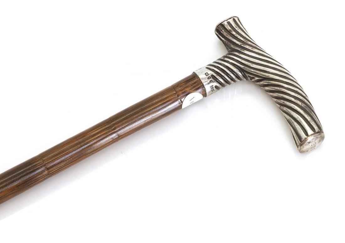 A silver-mounted walking cane, by Thomas Johnson, London, 1894, stamped Brigg, - 2