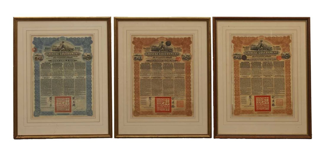 A group of three Chinese bonds, 20th century,: A group of three Chinese bonds, 20th century, 'The Chinese Government five per cent reorganisation loan of 1913 for £25,000,000 sterling', numbered '843541', '218322', and '567993' image 44.5 x