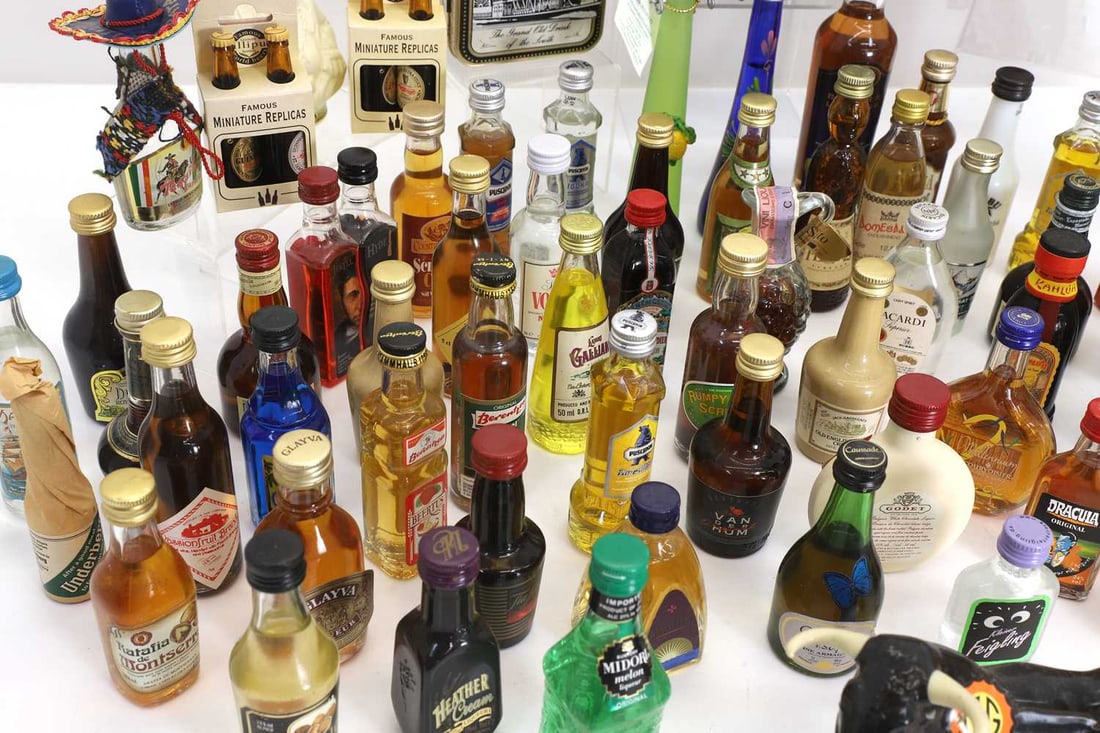 A crate of mixed miniature spirits, - 2