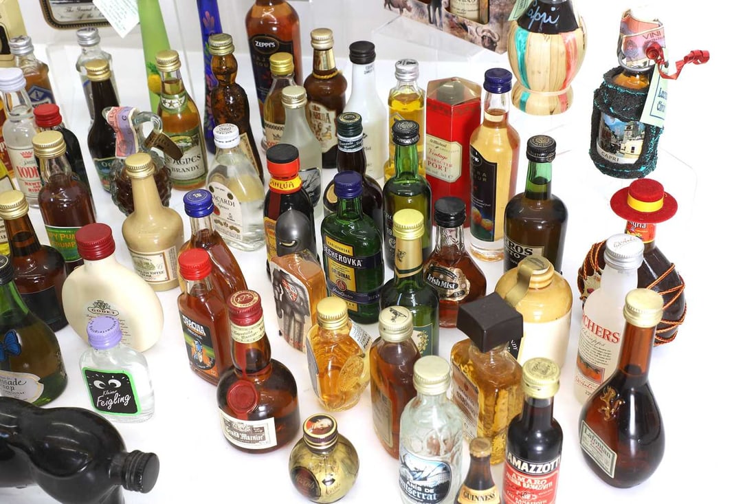 A crate of mixed miniature spirits, - 3