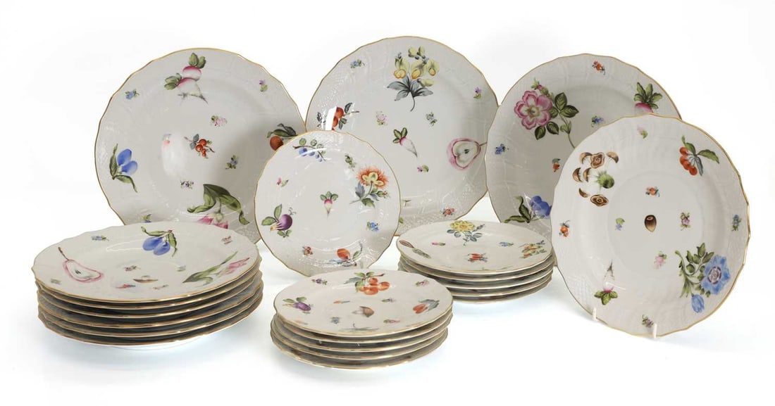 A Herend porcelain part dinner service, 20th century,: A Herend porcelain part dinner service, 20th century, 'Market Garden' pattern, consisting of eleven soup plates, eleven cake plates, twelve dinner plates, and twelve side plates, with gilded rims,