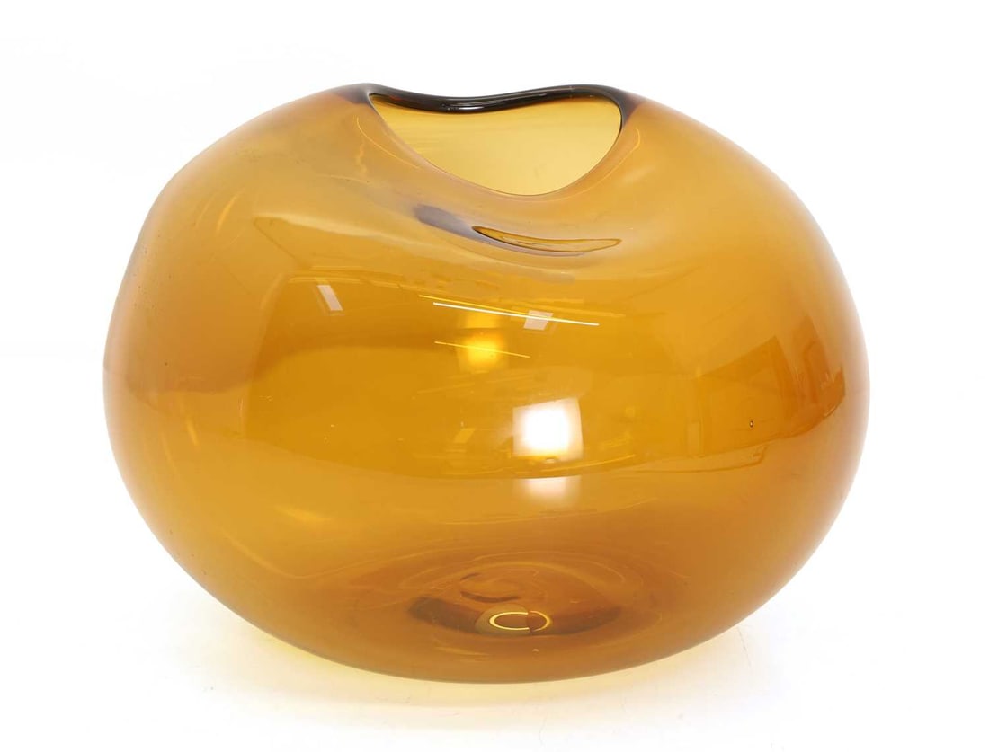 A Kate Hume studio glass vase, of recent manufacture,: A Kate Hume studio glass vase, of recent manufacture, amber glass 27cm wide, 23cm deep, 17.5cm high Condition Report: Overall good order. Some surface scratches to the underside.
