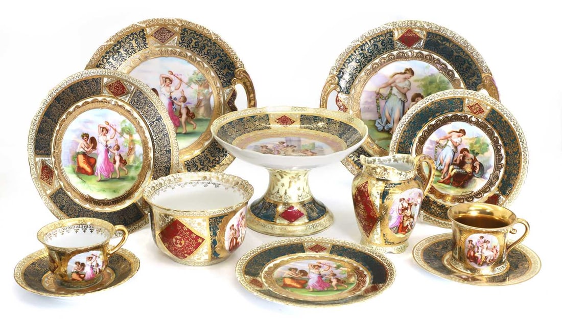 A Vienna porcelain tea and coffee service, late 19th early 20th century,: A Vienna porcelain tea and coffee service, late 19th early 20th century, to include twelve coffee cans, thirteen teacups and twelve saucers, eleven side plates, twelve small plates, twelve