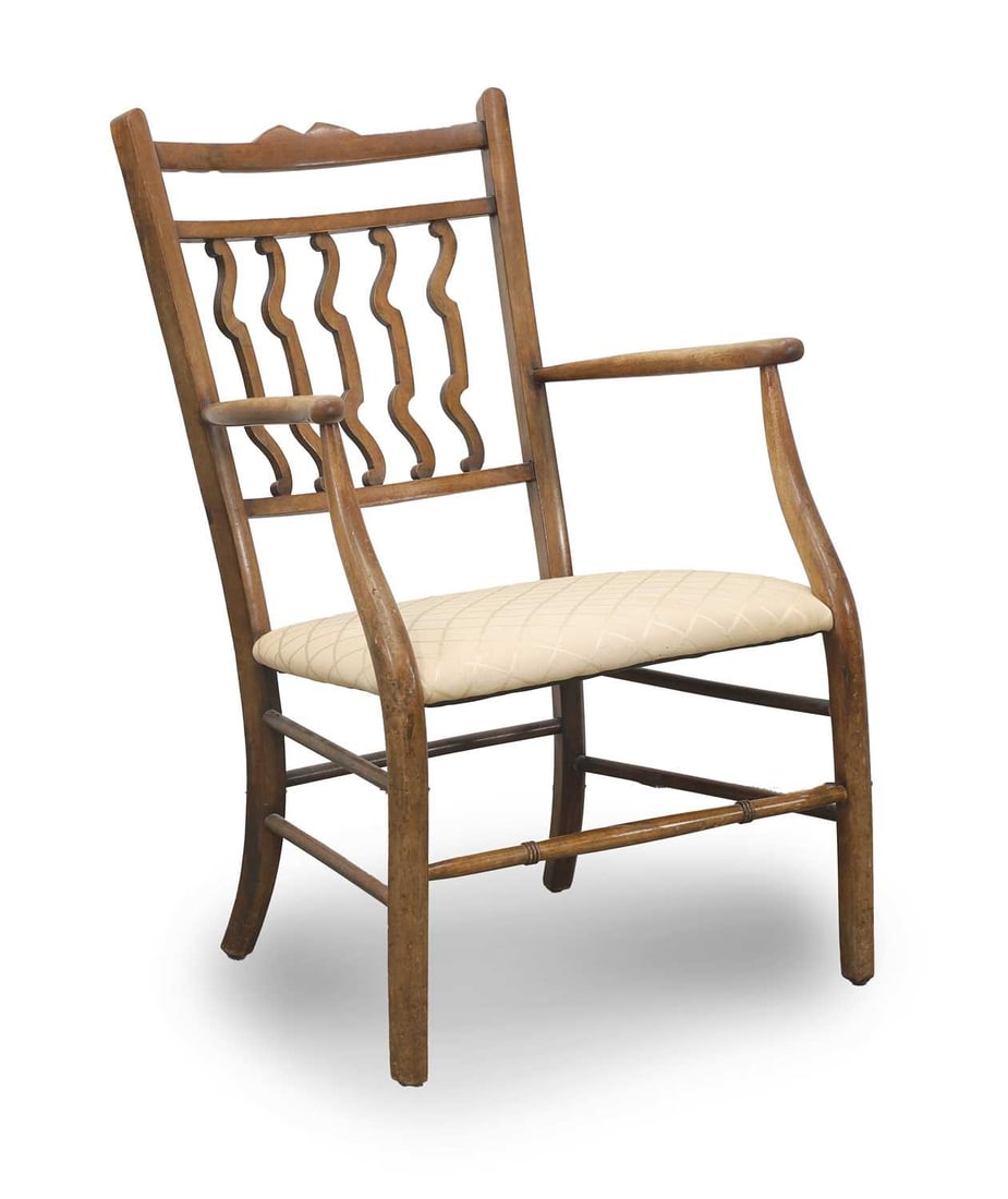 A Welsh Arts and Crafts armchair, 19th century,: A Welsh Arts and Crafts armchair, 19th century, with crooked spindles and shaped legs, with an upholstered seat 54cm wide, 46cm deep, 79cm high