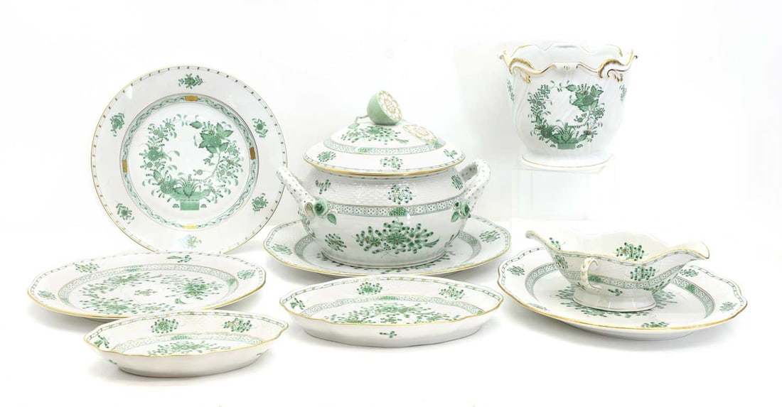 A Herend part service, early 20th century,: A Herend part service, early 20th century, Chinese Bouquet Apponyi Green pattern, including a large lidded tureen dish surmounted with lemon wedge finial, twenty-three dinner plates, a large serving d