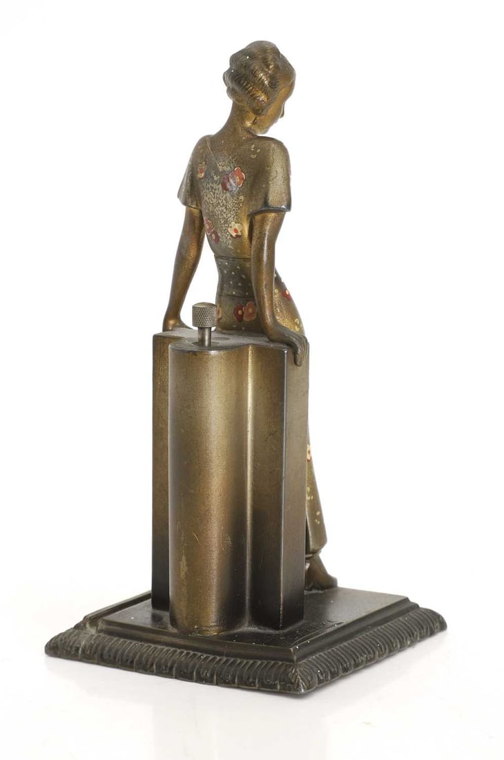 An Austrian Art Deco spelter table lighter, after Lorenzl, - 2