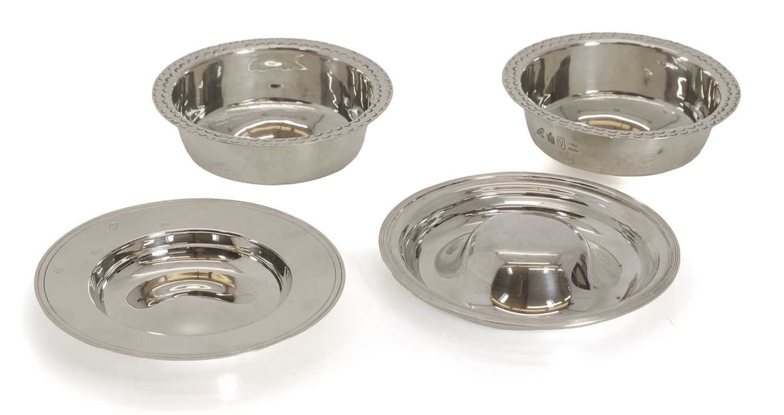 A collection of silver pin dishes,: A collection of silver pin dishes, to include a Gurnsey example 1996 , another pin dish by Carr's of Sheffield Ltd Sheffield, 1996, together with a close pair, branded with the Essex county cypher,