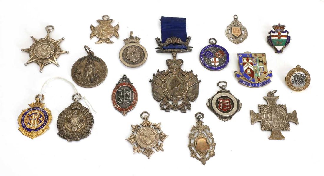 A collection of silver and enamelled medallions and badges, various dates, (1 of 1)