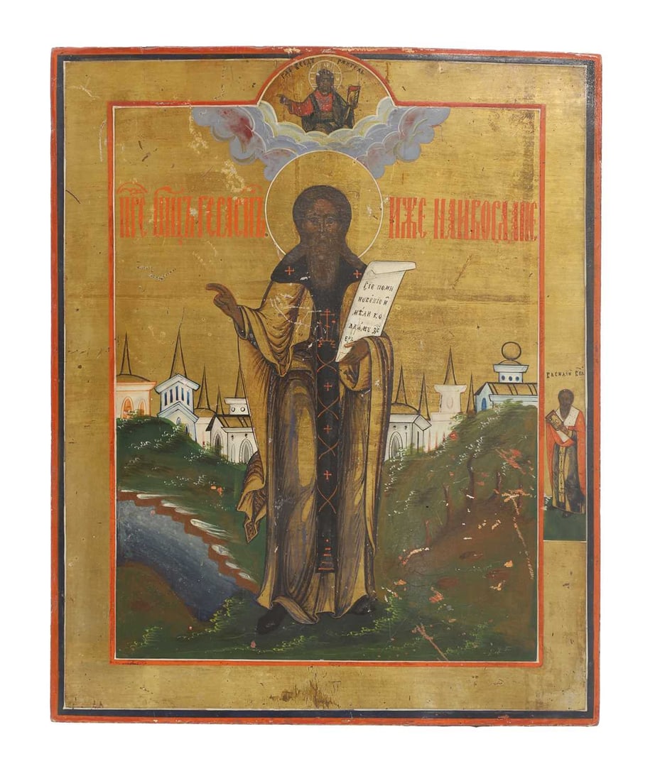 A Russian gilt and painted icon, late 19th century,: A Russian gilt and painted icon, late 19th century, on a panel, bordered with red and back, possibly depicting Saint Nilus the Faster 27 x 22.5cm Condition Report: Woodworn to the back, appears to be