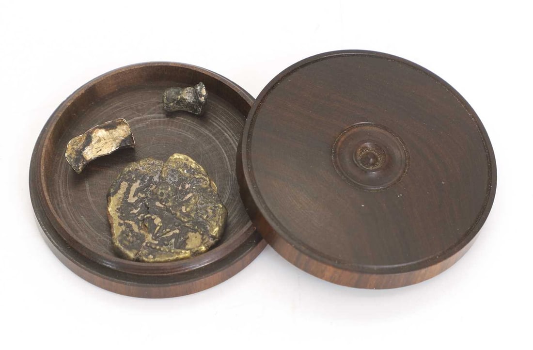 An imitation Cunobelin stater,: An imitation Cunobelin stater, with a copper core together with a piece of dental gold, 1.2g and dental amalgam in a circular rosewood box