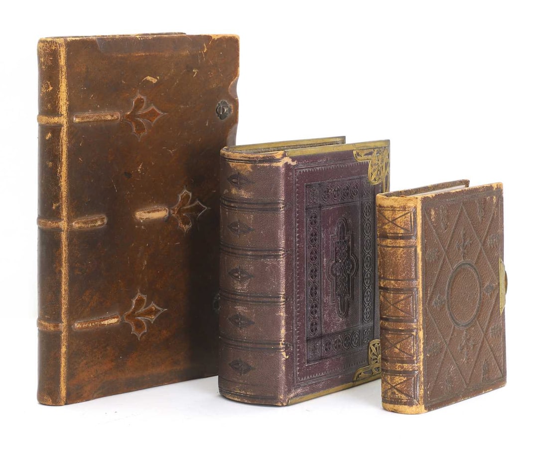 A collection of two Victorian photograph albums,: A collection of two Victorian photograph albums, and a scrapbook made by Kenneth Searight, containing signatures collected in different countries, all three books bound and two with metal mounts The