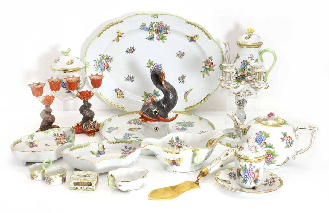 A Herend porcelain part service, early 20th century,: A Herend porcelain part service, early 20th century, Queen Victoria pattern, including a large serving plate with a large fish centerpiece, a teapot, a coffee pot, three large oval serving dishes,