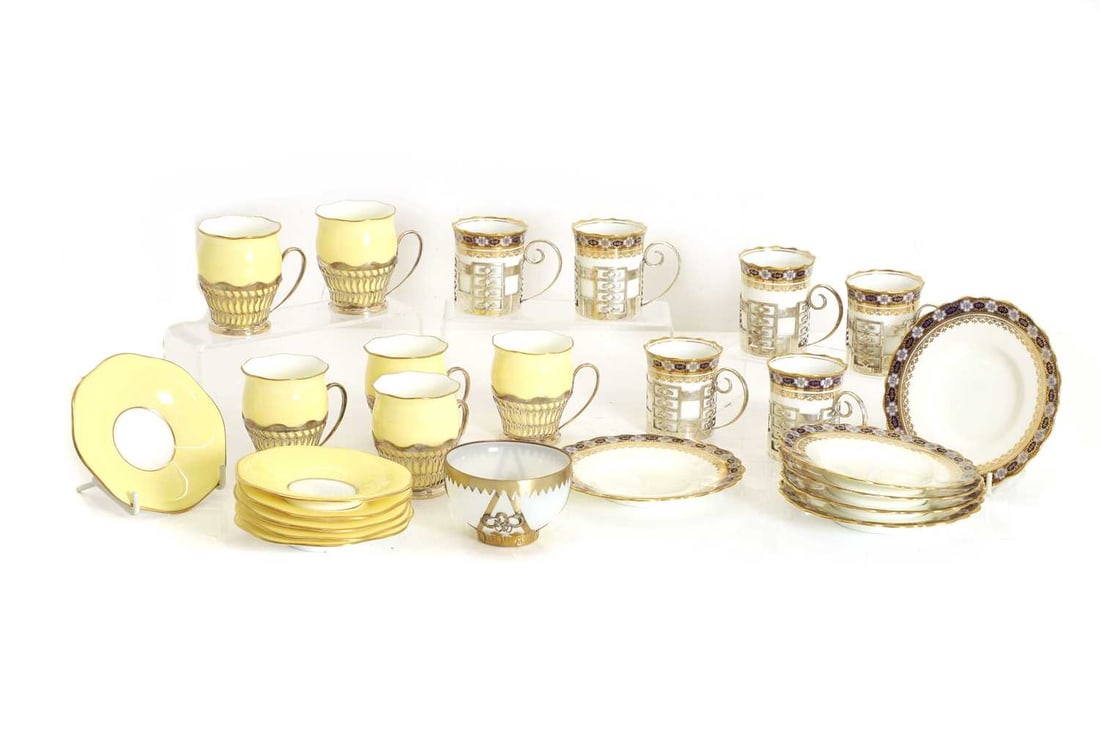 Two silver mounted coffee services, early 20th century,: Two silver mounted coffee services, early 20th century, comprising a finely decorated Aynsley coffee service, with six coffee cans and six saucers, each with gilt foliate decoration to colbalt blue