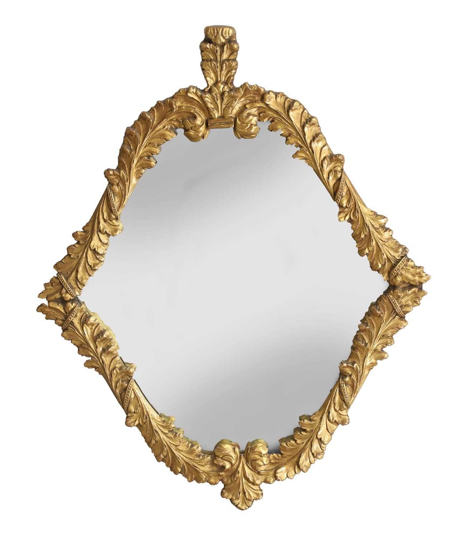 A continental gilt gesso mirror, late 19th century,: A continental gilt gesso mirror, late 19th century, the shaped plate within an acanthus decorated frame 65cm wide, 81cm high