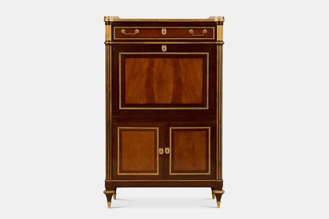 A Louis XVI mahogany, amaranth and ormolu secrétaire à abattant, late 18th century, French,: A Louis XVI mahogany, amaranth and ormolu secrétaire à abattant, late 18th century, French, attributed to Jean-Henri Riesener (1734-1806), the rectangular top with a pierced gallery border above a f