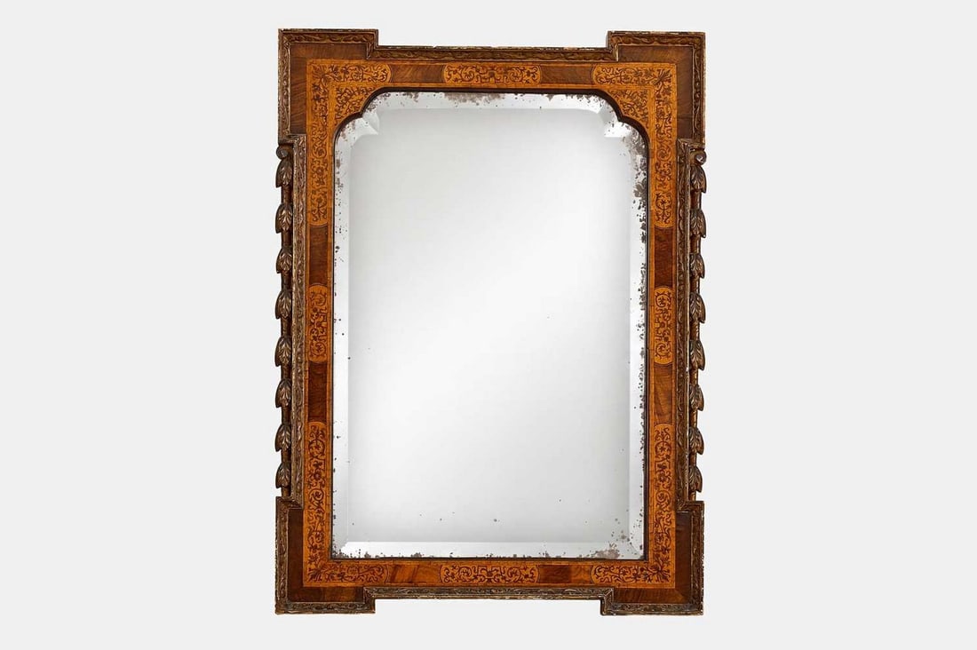 A George I walnut, parcel-gilt and seaweed marquetry mirror, early 18th century and later, (1 of 3)