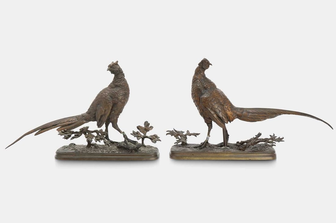 After Ferdinand Pautrot, a pair of bronze pheasant sculptures, 19th century,: After Ferdinand Pautrot, a pair of bronze pheasant sculptures, 19th century, each modelled with a turned head, mounted on a naturalistic base, inscribed 'F PAUTROT' (40.5cm wide, 11.5cm deep, 26cm hig