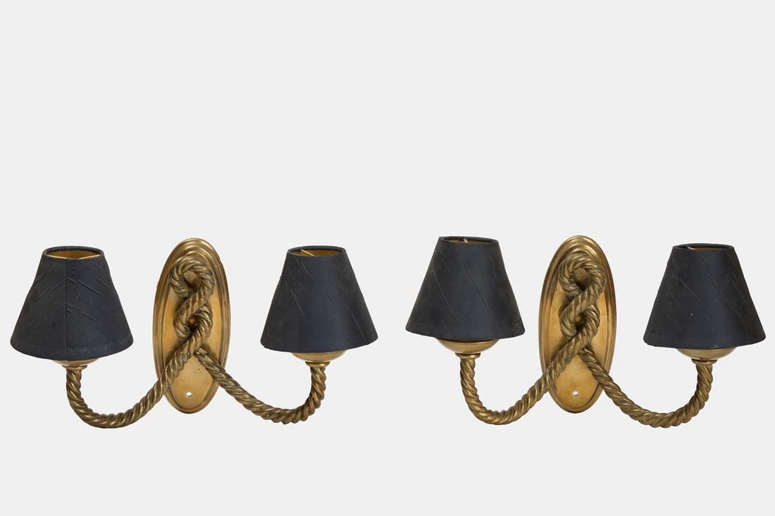 A pair of brass wall lights by Besselink & Jones, late 20th century,: A pair of brass wall lights by Besselink & Jones, late 20th century, each with a pair of rope-twist candle branches, with black silk Vaughan shades, fitted for electricity (34cm wide, 14cm deep, 22cm 