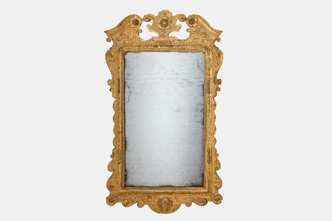 A George II carved giltwood and gesso pier mirror, circa 1735, (1 of 3)