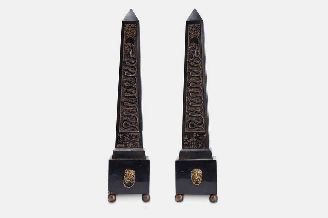 A pair of composite and polished stone obelisks. 20th century, (1 of 3)