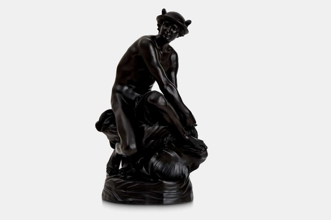 A Wedgwood black basalt figure of the Seated Mercury, late 19th century, after the antique, (1 of 3)
