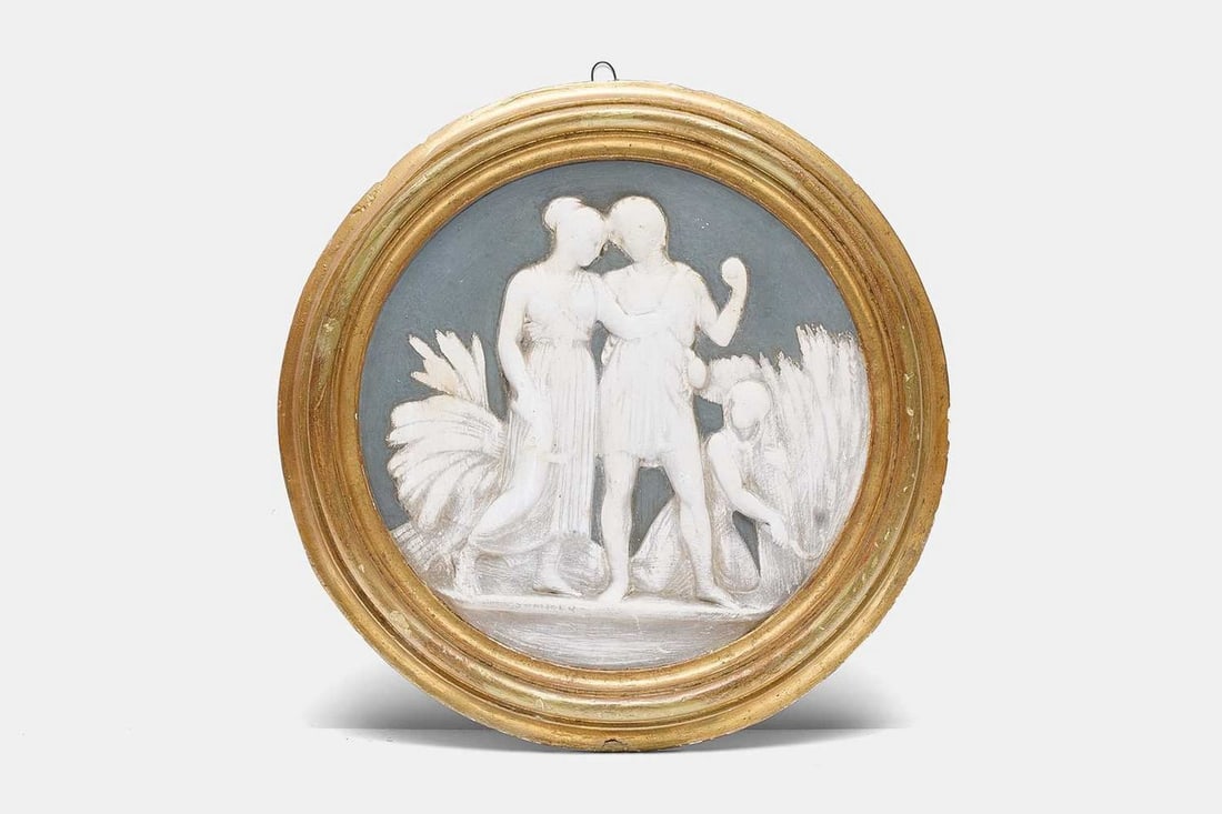 A relief plaster roundel of 'Youth or Summer', late 19th/early 20th century, after Bertel: A relief plaster roundel of 'Youth or Summer', late 19th/early 20th century, after Bertel Thorvaldsen, enclosed within an integral circular gilt frame (26cm diameter; framed 35cm diameter) Footnote: T