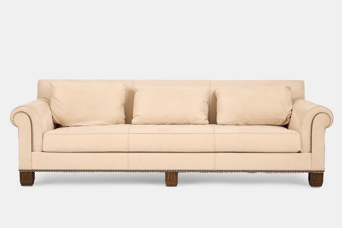 A three-seater sofa in the style of Christopher Guy, of recent manufacture, (1 of 5)