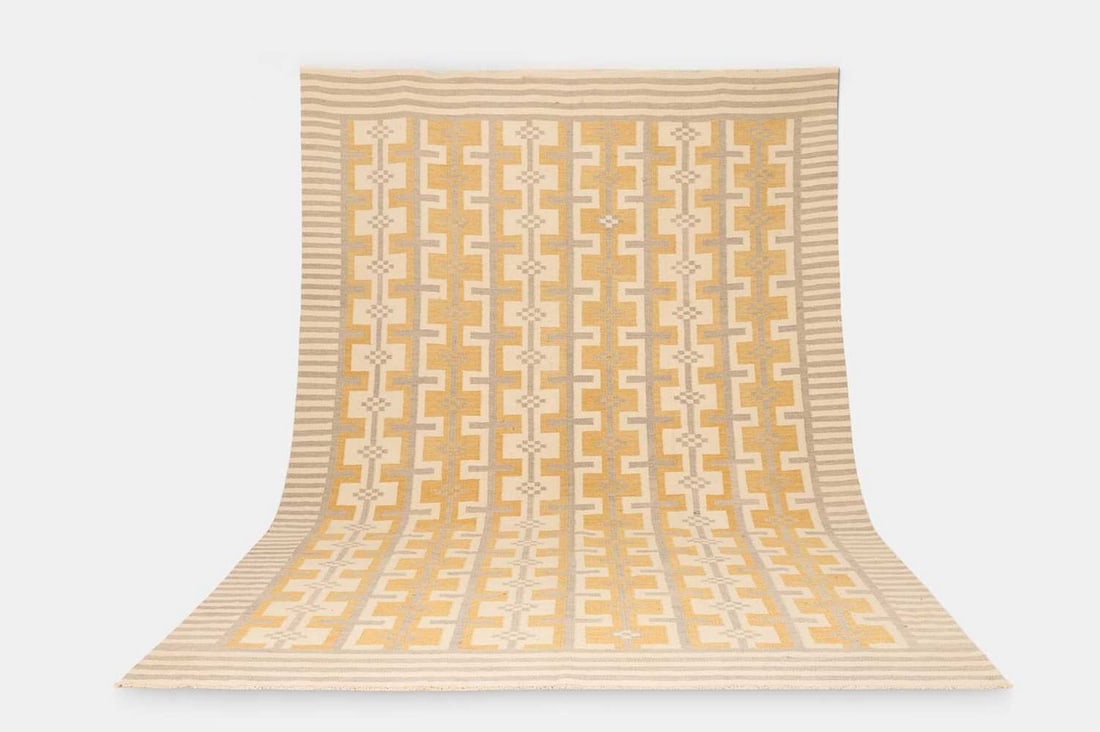 A flat-weave wool carpet of Scandinavian design, of recent manufacture, inspired by the work of (1 of 3)