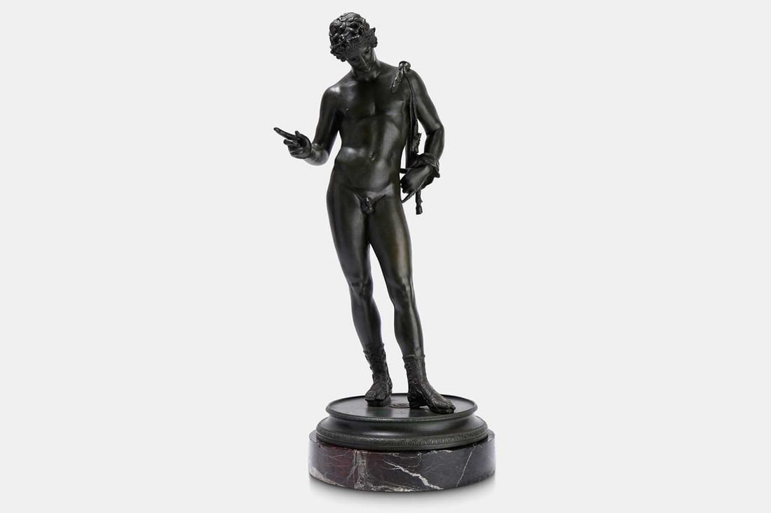A large grand tour patinated bronze figure of Narcissus, 19th century, Italian, after the antique,: A large grand tour patinated bronze figure of Narcissus, 19th century, Italian, after the antique, signed 'G. Nisini, Roma', raised on a veined marble revolving base (27.5cm wide, 27.5cm deep, 67cm hi