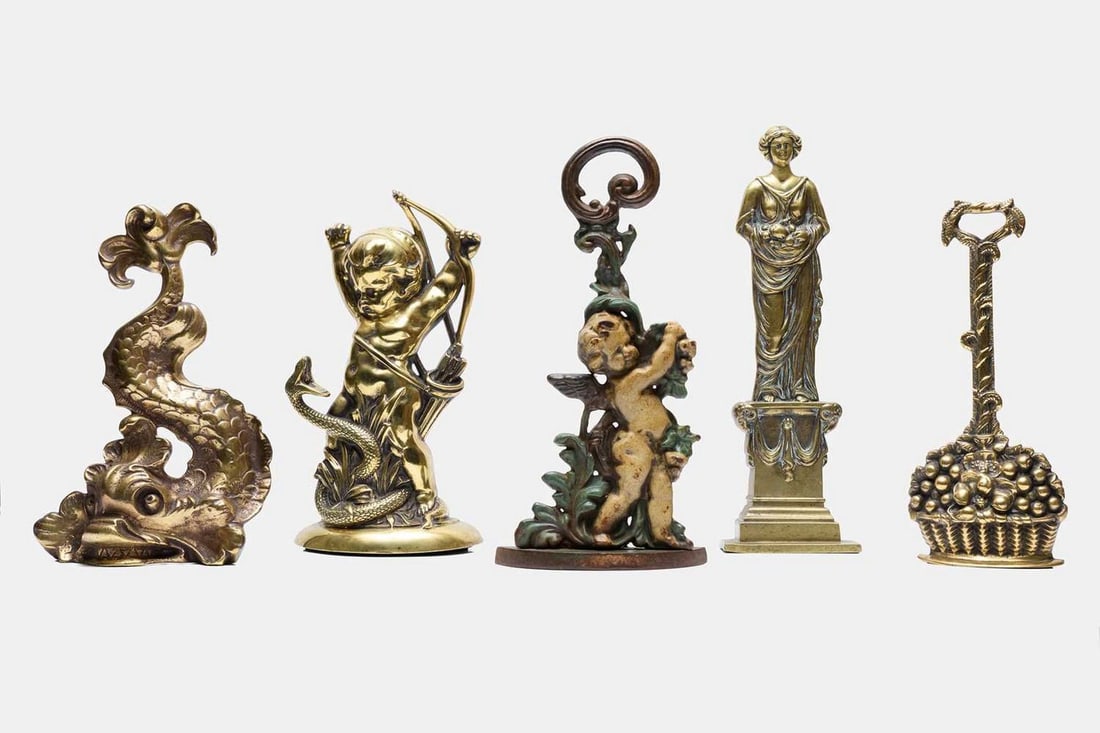 A collection of five doorstops, late 19th/early 20th century, (1 of 2)