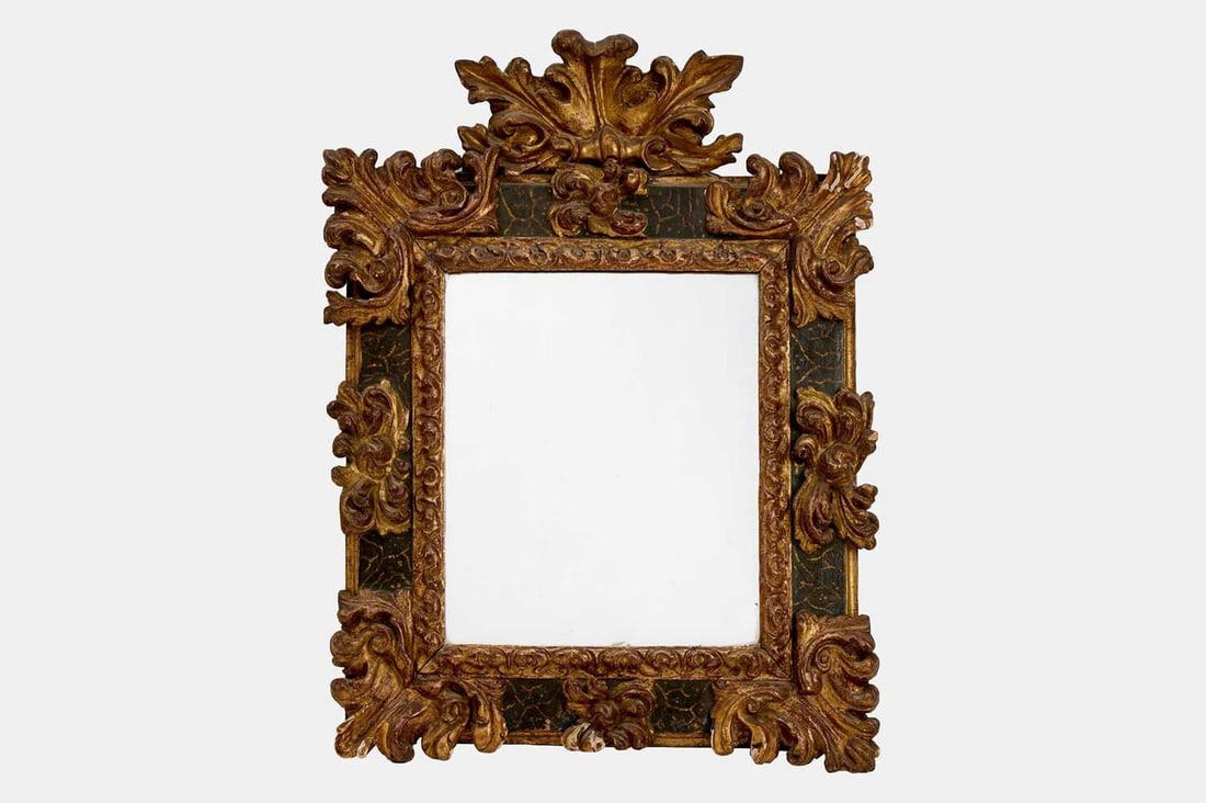A baroque-style painted giltwood mirror, 18th century with a later plate, (1 of 2)