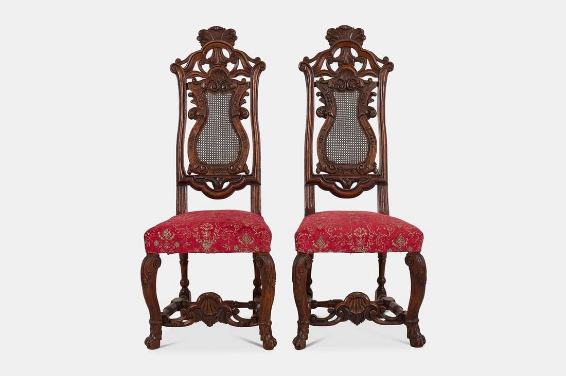 A pair of carved walnut side chairs, 17th century and later, in the manner of Daniel Marot, (1 of 3)