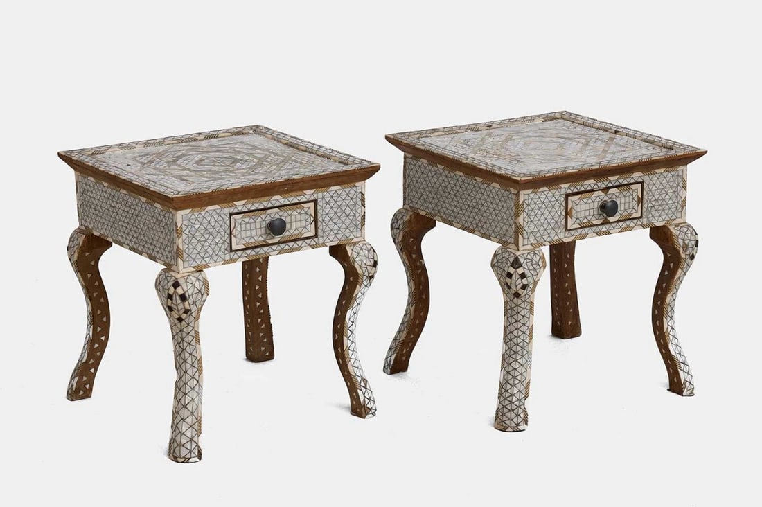 A pair of fruitwood, bone and mother-of-pearl-inlaid side tables, 20th century, Syrian, Damascus,: A pair of fruitwood, bone and mother-of-pearl-inlaid side tables, 20th century, Syrian, Damascus, each with a panelled square top above a short drawer, raised on cabriole supports, with geometric deco