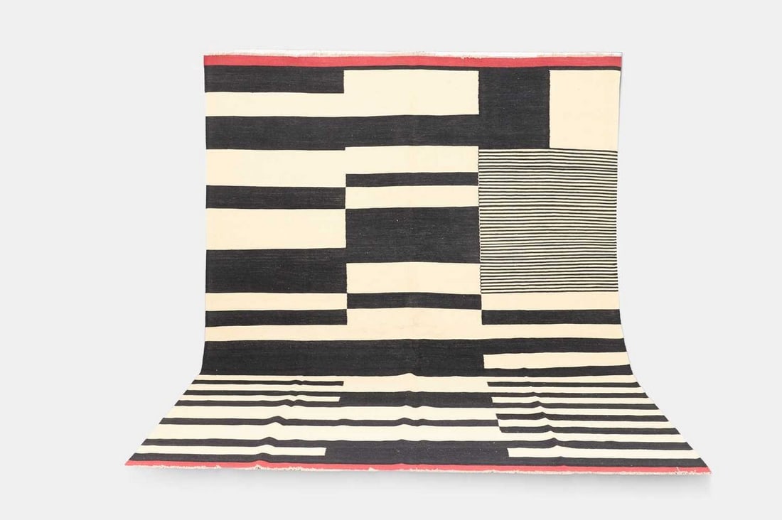 A Bauhaus-inspired flat-weave wool carpet, of recent manufacture,: A Bauhaus-inspired flat-weave wool carpet, of recent manufacture, woven with alternating black and white stripes (354 x 263cm) Condition Report: Overall the piece presents in very good structural and 