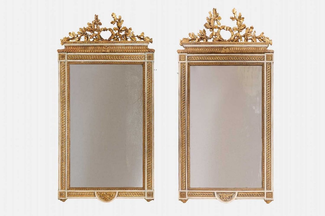A pair of large Louis XVI-style painted and parcel-gilt wooden pier mirrors, late 19th century, (1 of 3)