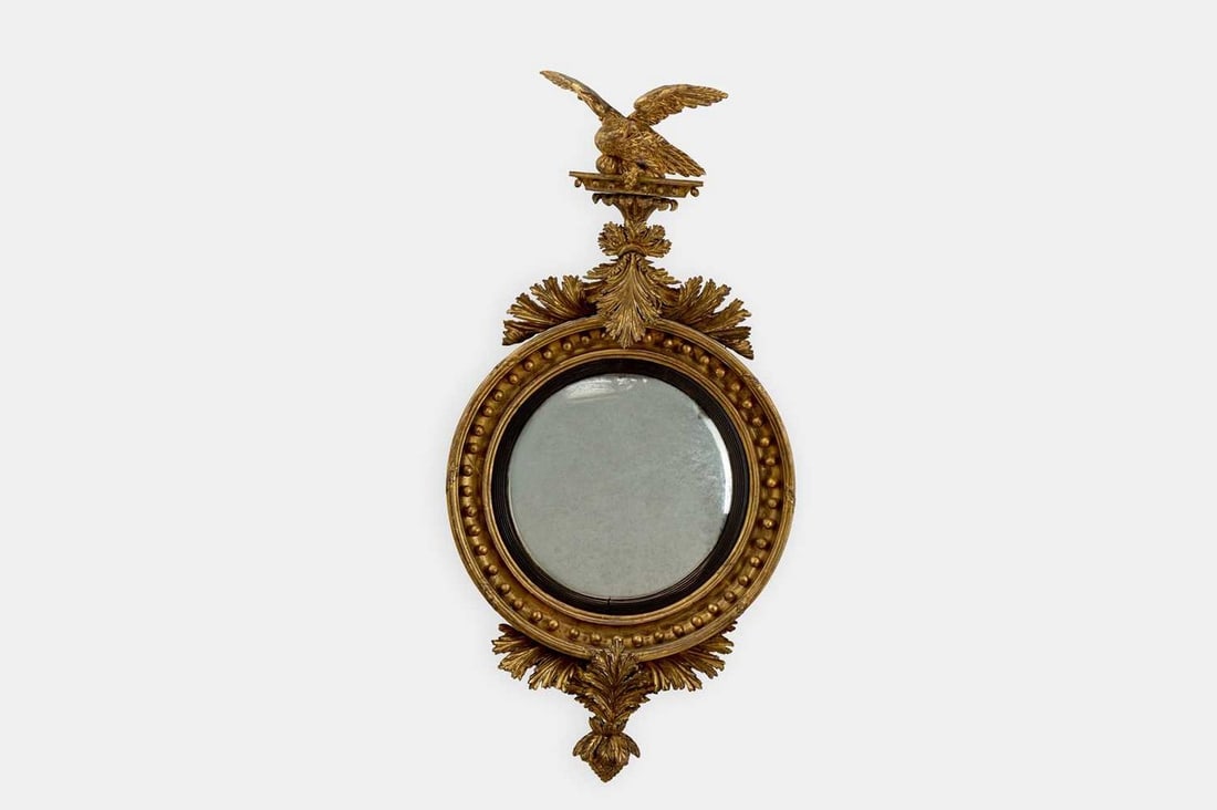 A Regency giltwood convex mirror, circa 1820, (1 of 3)