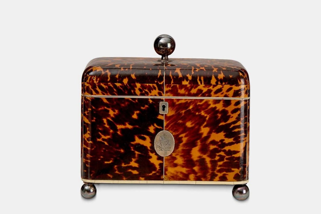 A Regency tortoiseshell, ivory and silver-mounted tea caddy, first quarter of the 19th century, (1 of 4)